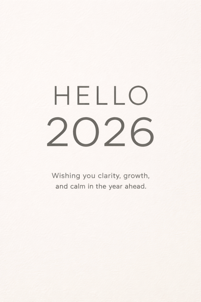 15 ChatGPT Prompts for New Year Cards Create a modern digital New Year card with a soft off-white background featuring a subtle paper grain texture. Place large bold sans-serif typography at the center displaying the text “HELLO 2026” in muted charcoal color. Below it, add smaller light-weight text reading “Wishing you clarity, growth, and calm in the year ahead”. Maintain generous white space, perfect alignment, and a clean minimalist aesthetic. Use aspect ratio 3:4.